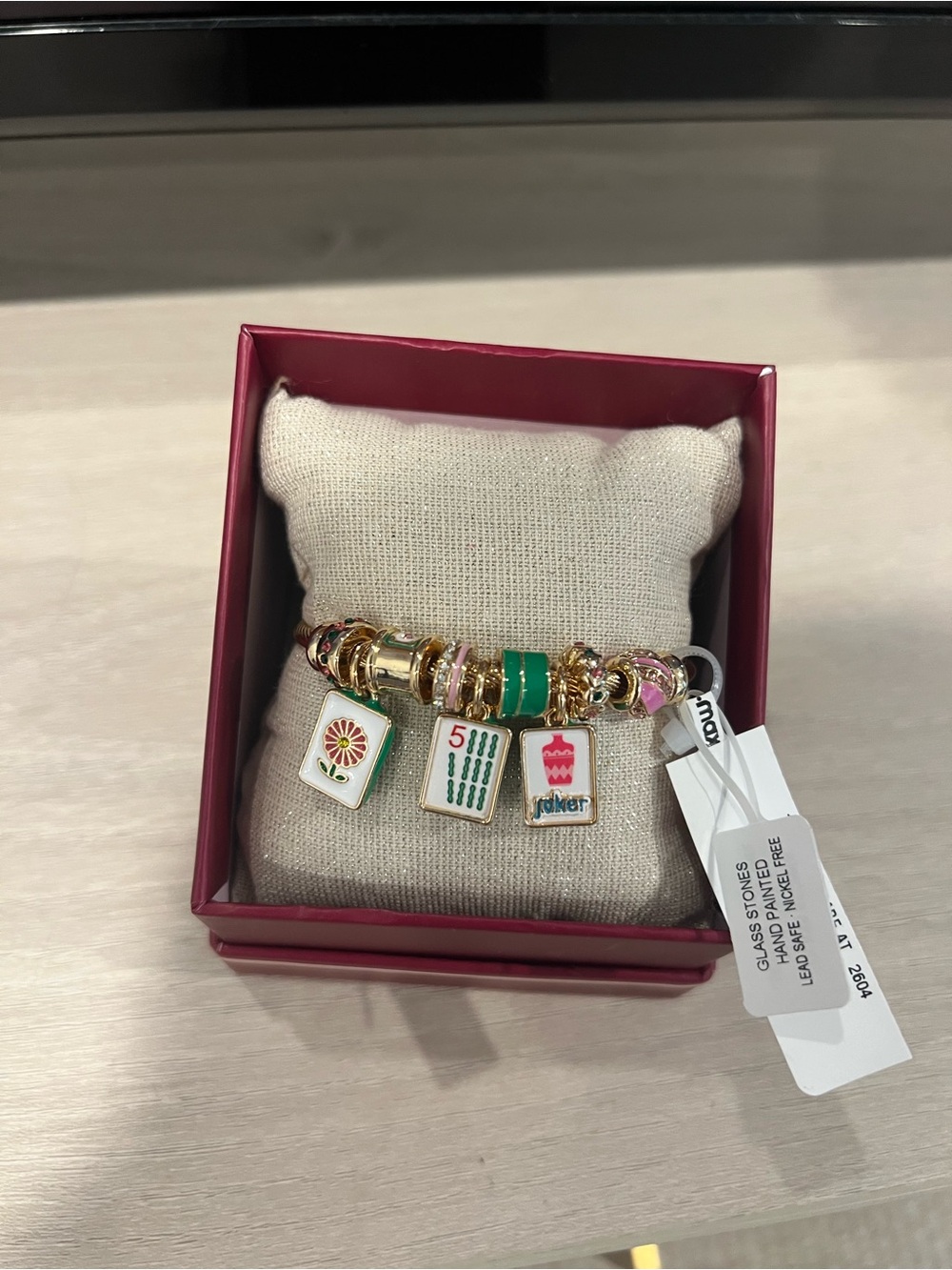 Gold-Tone Mahjong Charm Bracelet with Green & Pink Accents